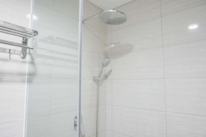 Fancy and Nice 1BR at Ciputra International Apartment By Travelio